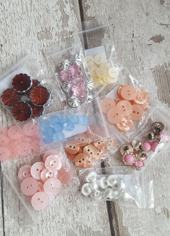 Jc keeps us stocked up with lots of buttons 
 .50p per pack